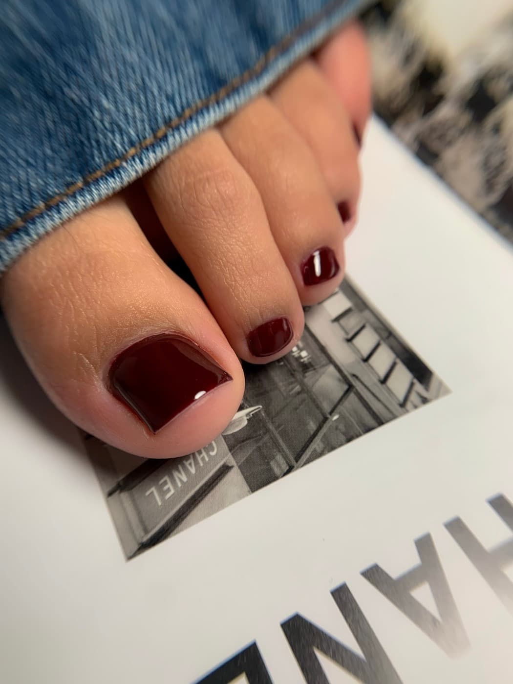 Dry pedicure in wine red